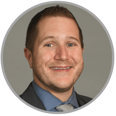 Male wearing suit smiling