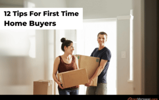 Woman and man carrying moving boxes into a house